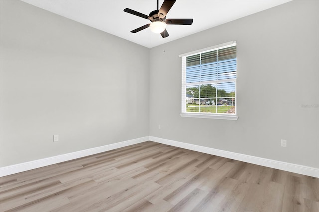 unfurnished room with light hardwood / wood-style flooring and ceiling fan