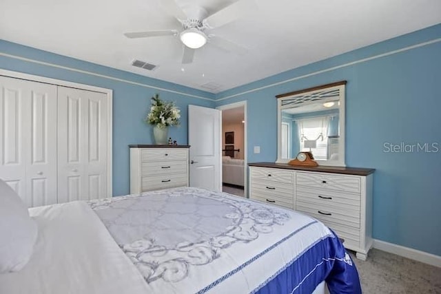 bedroom with a closet, carpet floors, and ceiling fan