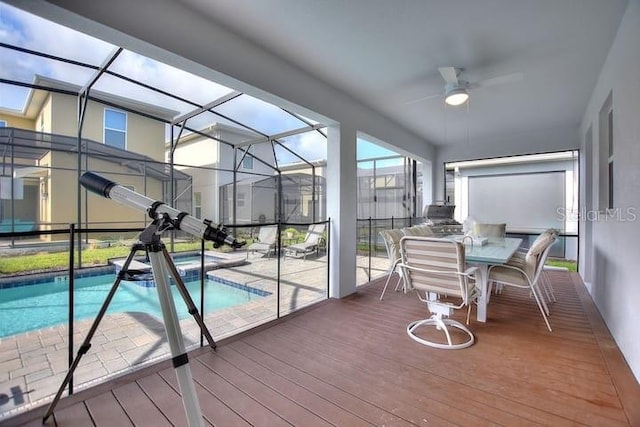 view of swimming pool with ceiling fan