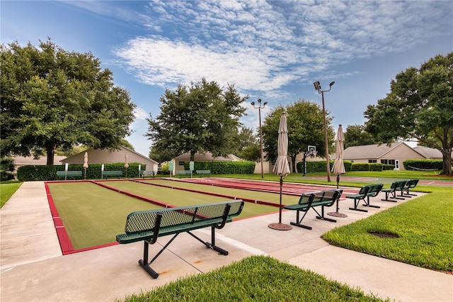 view of home's community featuring a yard