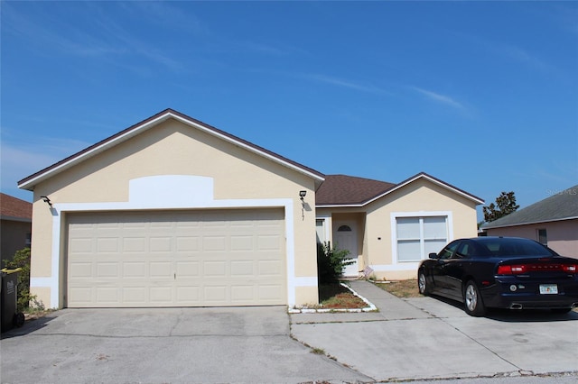 ranch-style house featuring a garage