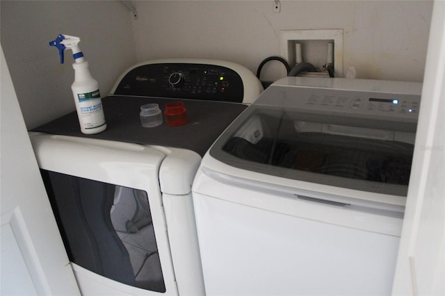 laundry room with washing machine and dryer and washer hookup