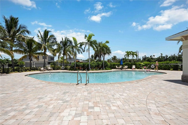 view of swimming pool featuring a patio area