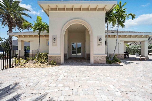 doorway to property featuring a patio