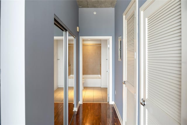 hallway featuring dark wood-type flooring