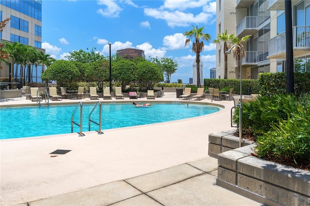 view of pool featuring a patio