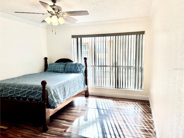 bedroom with crown molding, a textured ceiling, and ceiling fan