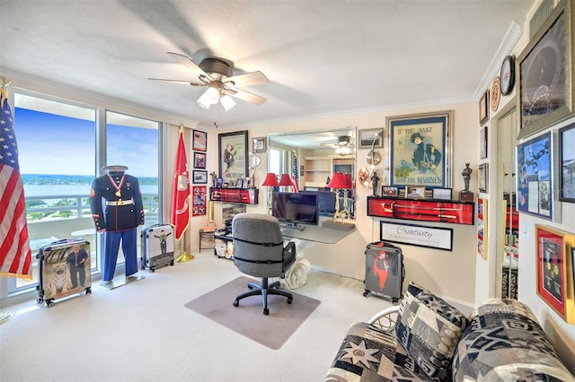 home office with crown molding and ceiling fan