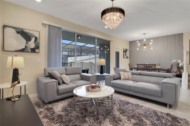 tiled living room featuring a chandelier