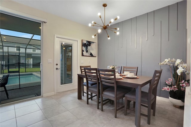 dining room featuring an inviting chandelier and light tile flooring