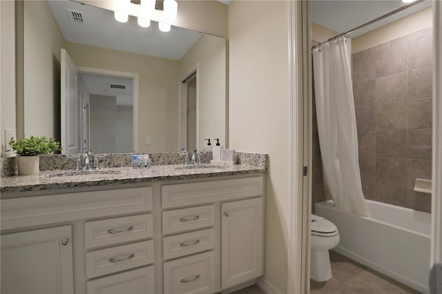 full bathroom featuring tile floors, shower / bath combination with curtain, double vanity, and toilet