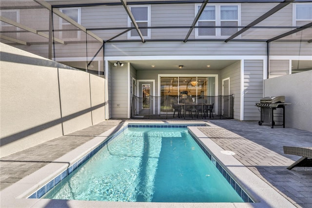 view of swimming pool with a patio area and area for grilling