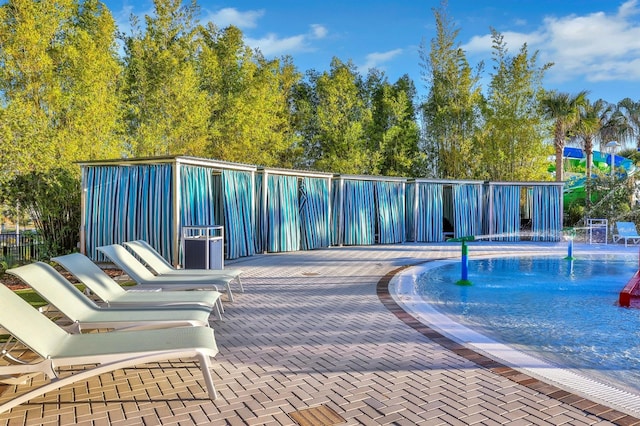 view of pool featuring a patio area