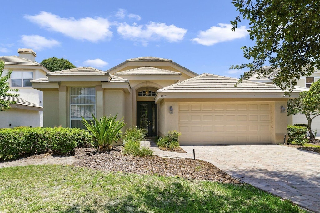 view of front of home with a garage