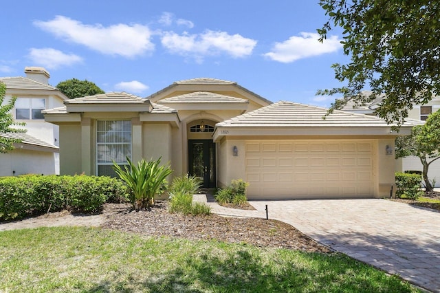 view of front of home with a garage