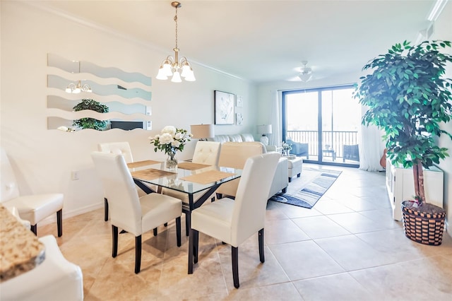 dining space featuring crown molding, light tile patterned floors, and ceiling fan with notable chandelier