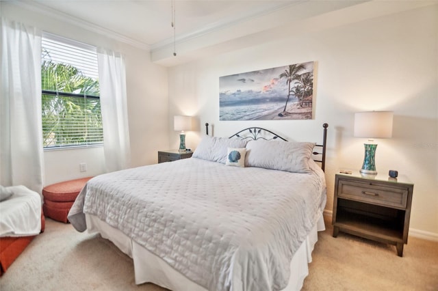 carpeted bedroom featuring ornamental molding