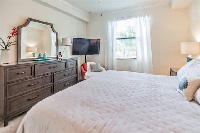 bedroom featuring crown molding