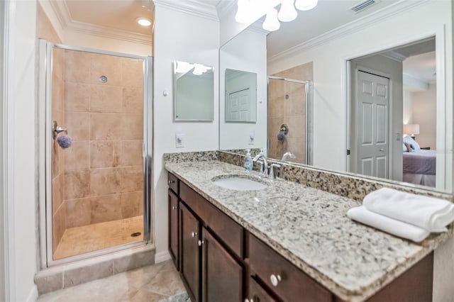 bathroom featuring vanity, an enclosed shower, and ornamental molding