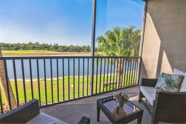 sunroom with a water view