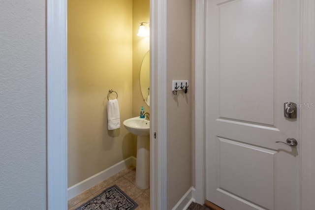 bathroom with sink and tile patterned floors