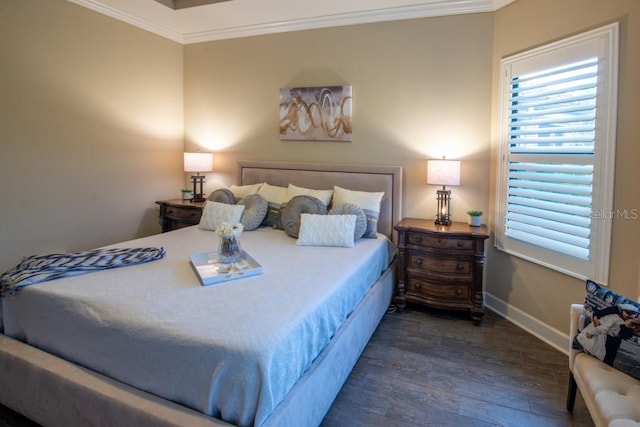 bedroom featuring crown molding and dark hardwood / wood-style flooring