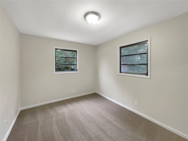 view of carpeted spare room