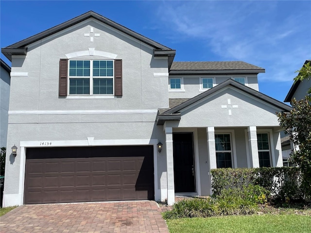 front of property featuring a garage