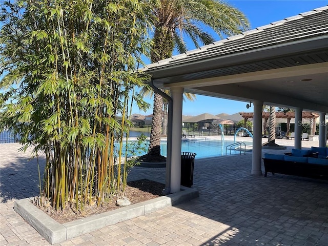 view of patio / terrace with a community pool