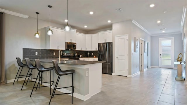 kitchen with white cabinetry, stainless steel fridge with ice dispenser, kitchen peninsula, electric stove, and backsplash