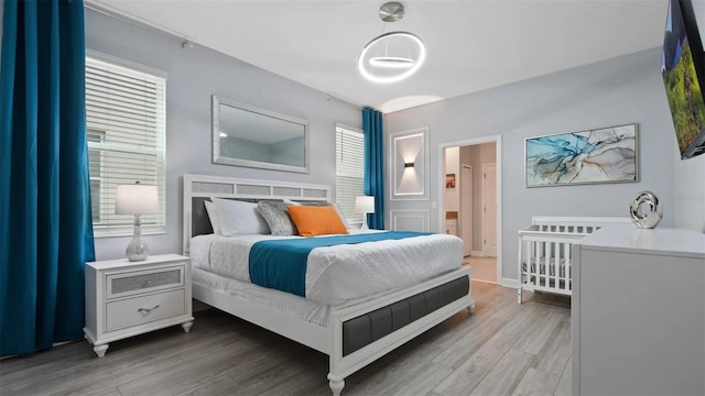 bedroom featuring hardwood / wood-style flooring