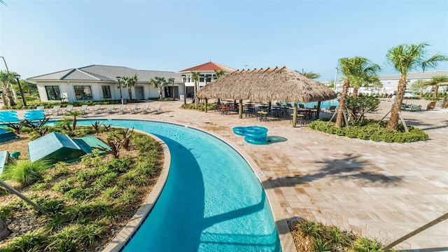 view of property's community featuring a gazebo and a swimming pool