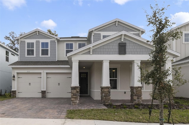 craftsman house featuring a garage