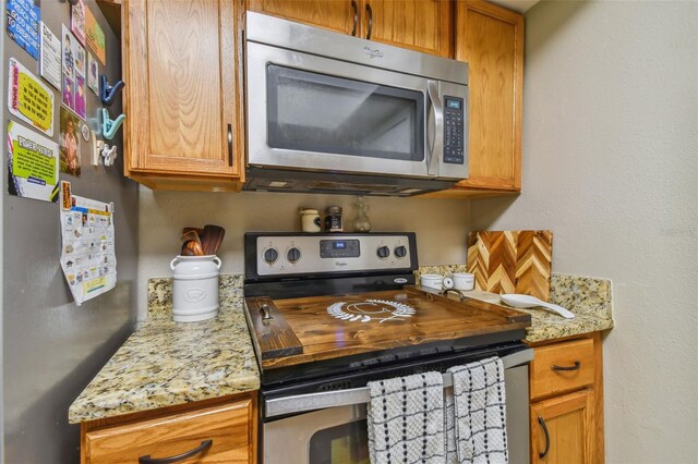 kitchen with appliances with stainless steel finishes