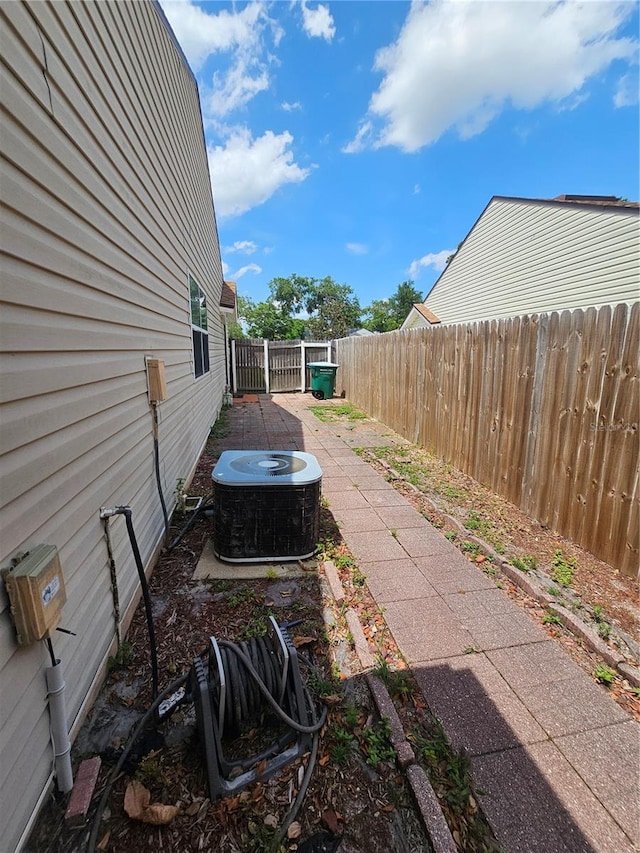 view of yard featuring central AC