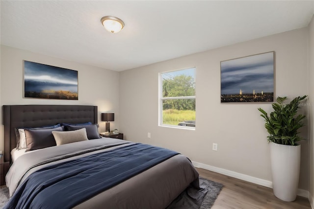 bedroom featuring hardwood / wood-style floors