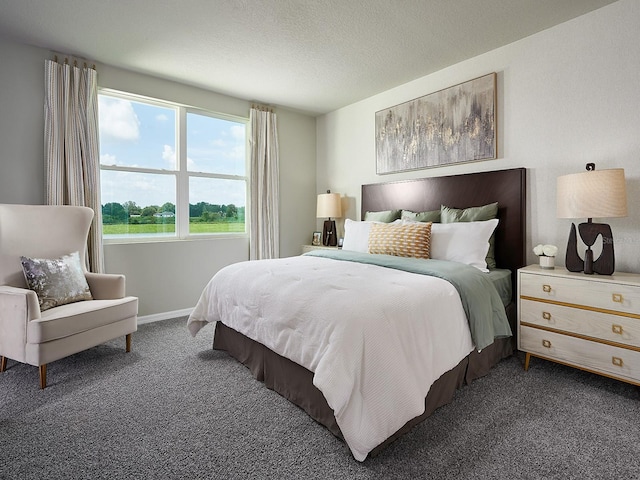 bedroom featuring dark colored carpet