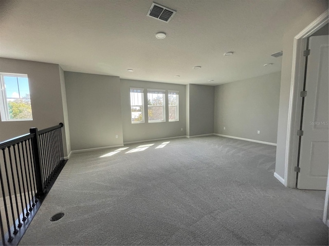 spare room with carpet flooring