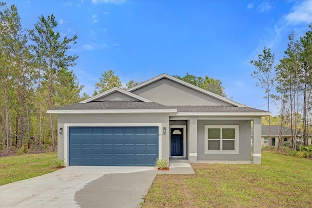 ranch-style house featuring a front lawn and a garage