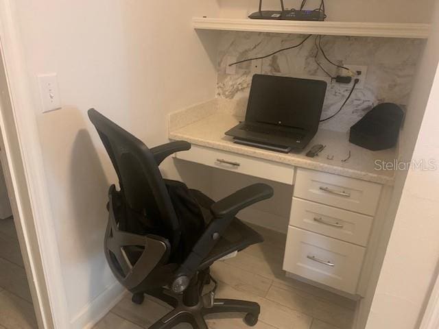 office space featuring light tile flooring