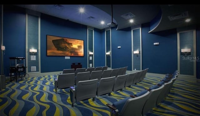 home theater room featuring carpet floors