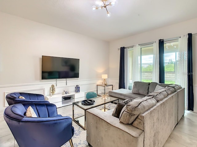 living room featuring a notable chandelier