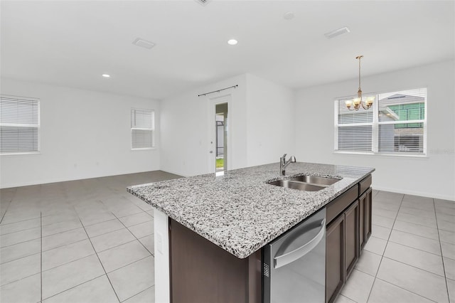 5115 Lake Hamlin Trl, Winter Garden, FL 34787 - kitchen featuring a center island with sink, pendant lighting, sink, dishwasher, and light tile floors