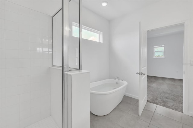 5115 Lake Hamlin Trl, Winter Garden, FL 34787 - bathroom featuring tile floors and shower with separate bathtub