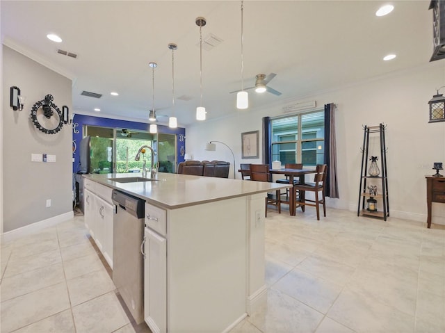 kitchen with stainless steel dishwasher, an island with sink, decorative light fixtures, sink, and ceiling fan