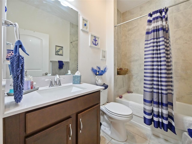 full bathroom featuring tile floors, shower / bathtub combination with curtain, vanity with extensive cabinet space, and toilet