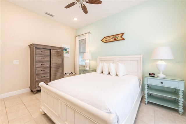 tiled bedroom with ceiling fan