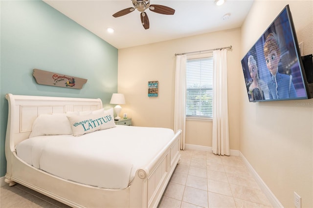 tiled bedroom featuring ceiling fan