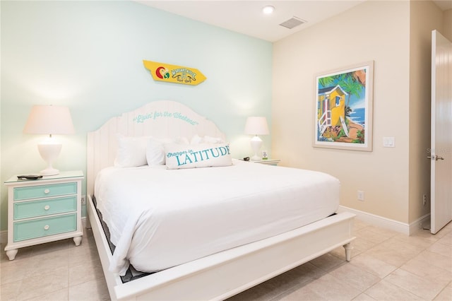 bedroom featuring light tile patterned flooring