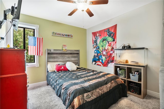 carpeted bedroom featuring ceiling fan